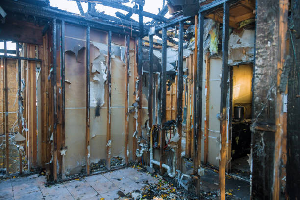 Professional Emergency Fire Damage Restoration technician working in Spencerville, MD